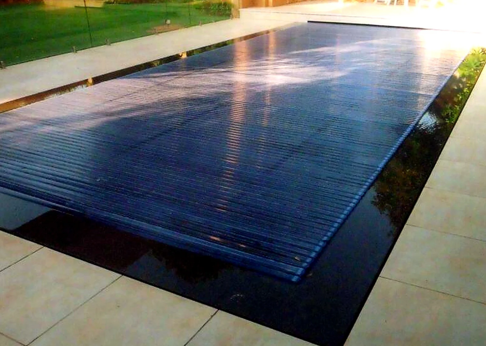 Covered pool in a dark finish