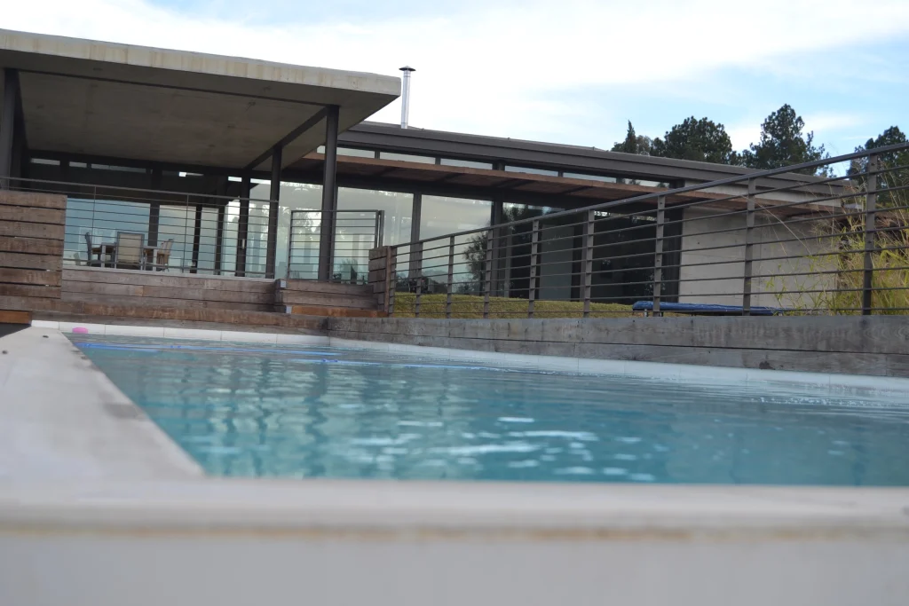 Raised infinity pool over the veld — completed