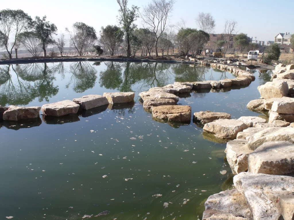 Water garden with ponds and rill, Waterfall — during construction